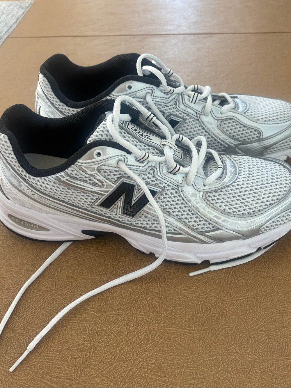 New Balance mens White and Black Mesh Running Shoes